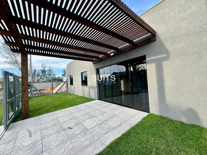 Casa térrea mobiliada, bem localizada em Atlântida Sul.: 1ª foto da galeria de imagens do imóvel