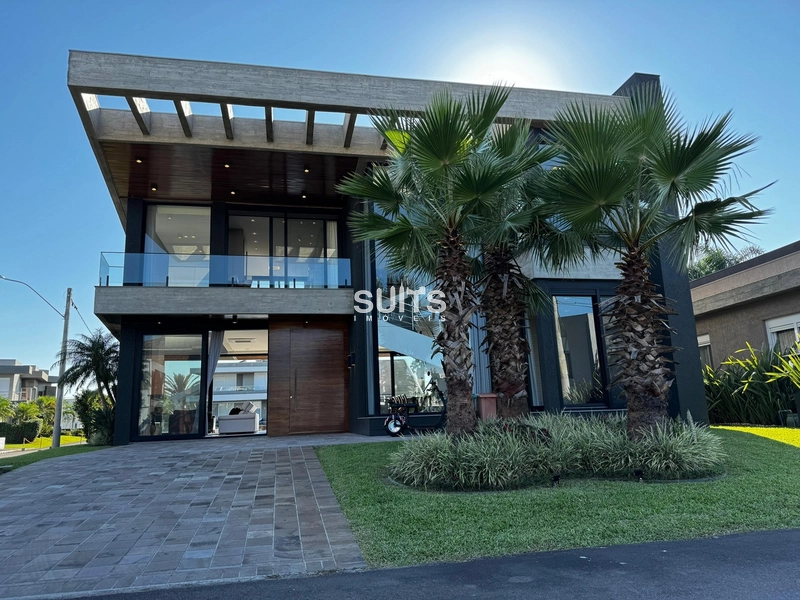 Incrível sobrado de esquina e na beira do lago no condomínio Malibu: 3ª foto da galeria de imagens do imóvel