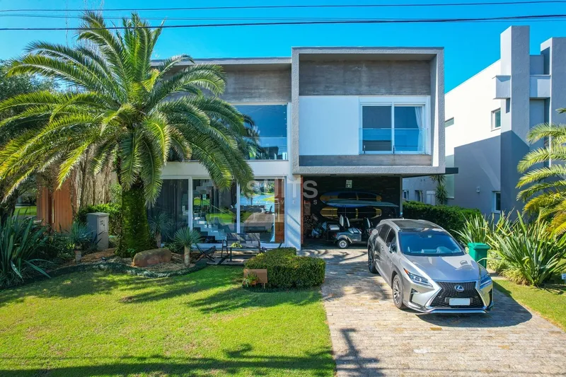 Excelente sobrado mobiliado e decorado no condomínio Enseada: 1ª foto da galeria de imagens do imóvel