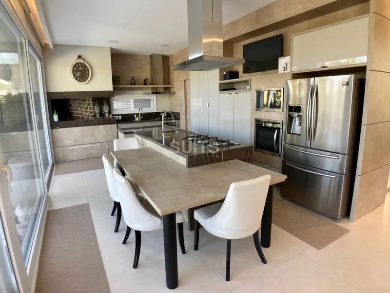 Incrível sobrado beira lago no condomínio Villaggio em Atlântida: 6ª foto da galeria de imagens do imóvel