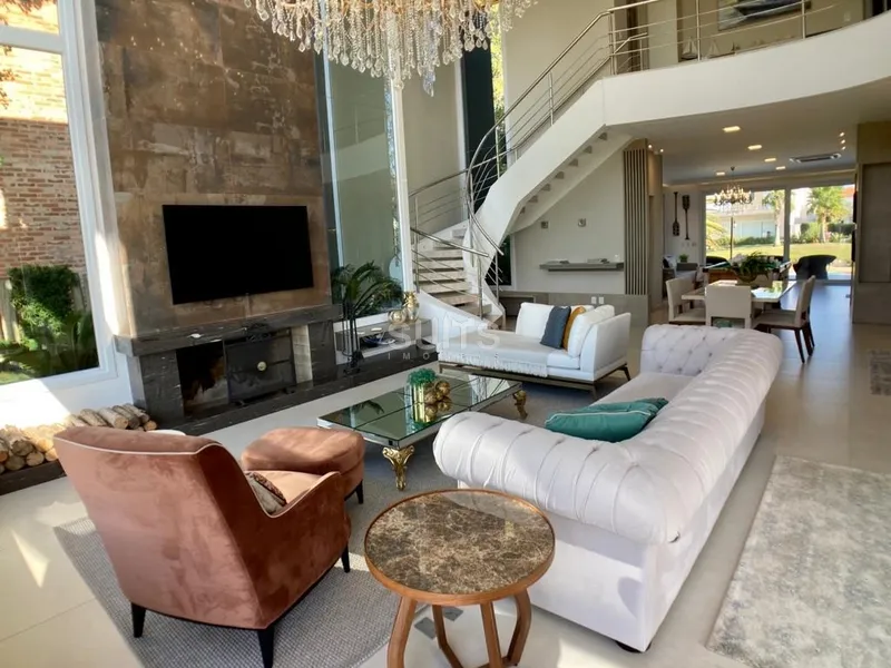 Incrível sobrado beira lago no condomínio Villaggio em Atlântida: 2ª foto da galeria de imagens do imóvel