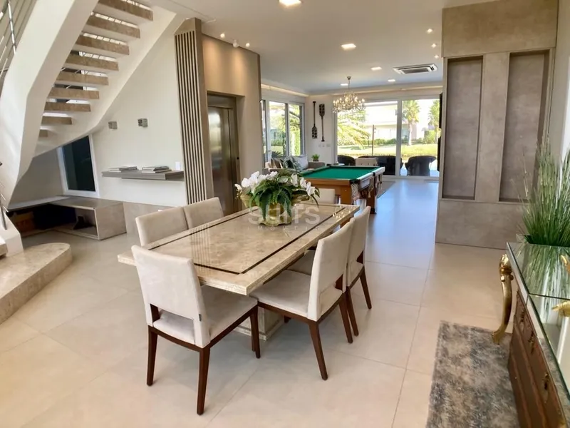 Incrível sobrado beira lago no condomínio Villaggio em Atlântida: 4ª foto da galeria de imagens do imóvel