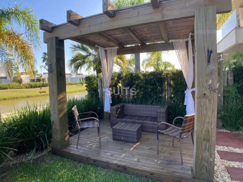 Incrível sobrado beira lago no condomínio Villaggio em Atlântida: 18ª foto da galeria de imagens do imóvel