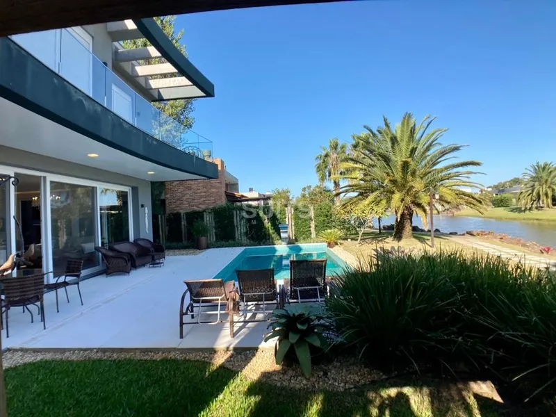 Incrível sobrado beira lago no condomínio Villaggio em Atlântida: 19ª foto da galeria de imagens do imóvel