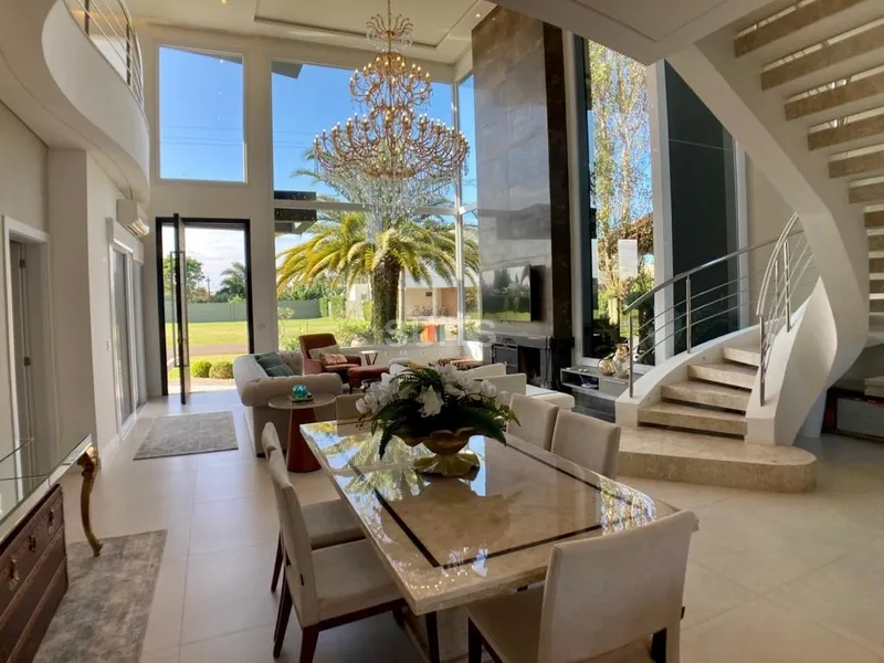 Incrível sobrado beira lago no condomínio Villaggio em Atlântida: 3ª foto da galeria de imagens do imóvel