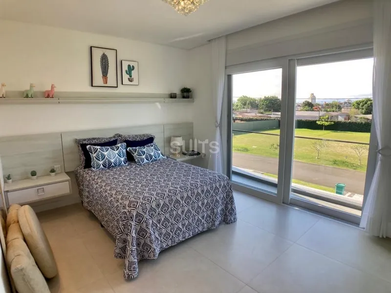 Incrível sobrado beira lago no condomínio Villaggio em Atlântida: 11ª foto da galeria de imagens do imóvel