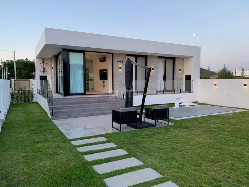 LINDA CASA DE ESQUINA NA PRAIA DE ATLANTIDA SUL: 2ª foto da galeria de imagens do imóvel