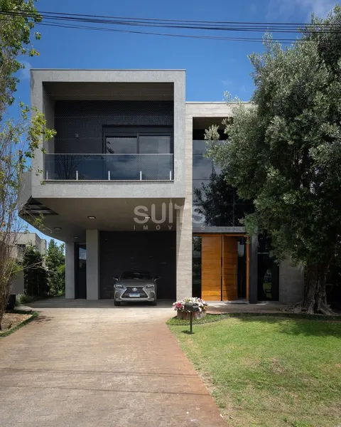 Incrível mansão as margens do lago no condomínio Enseada: 2ª foto da galeria de imagens do imóvel