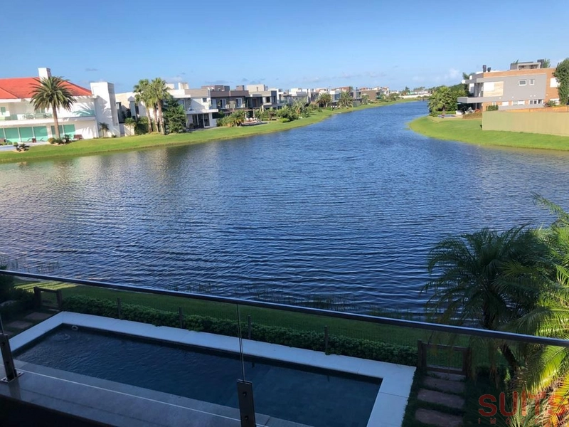 Belíssimo sobrado beira lago à venda no condomínio Enseada: 99ª foto da galeria de imagens do imóvel