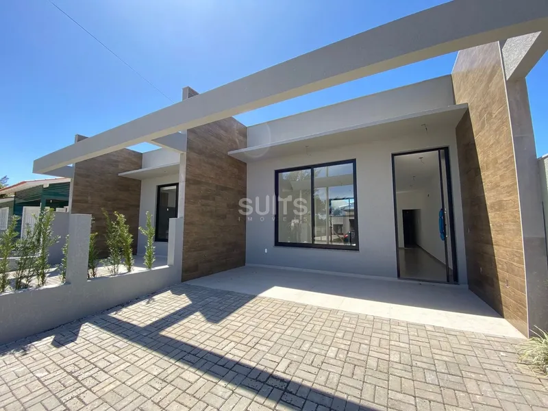 Excelente casa geminada no Centro da Praia de Xangri-Lá: 2ª foto da galeria de imagens do imóvel