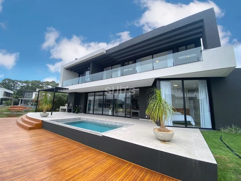 Incrível sobrado à beira do lago no condomínio Malibu: 7ª foto da galeria de imagens do imóvel