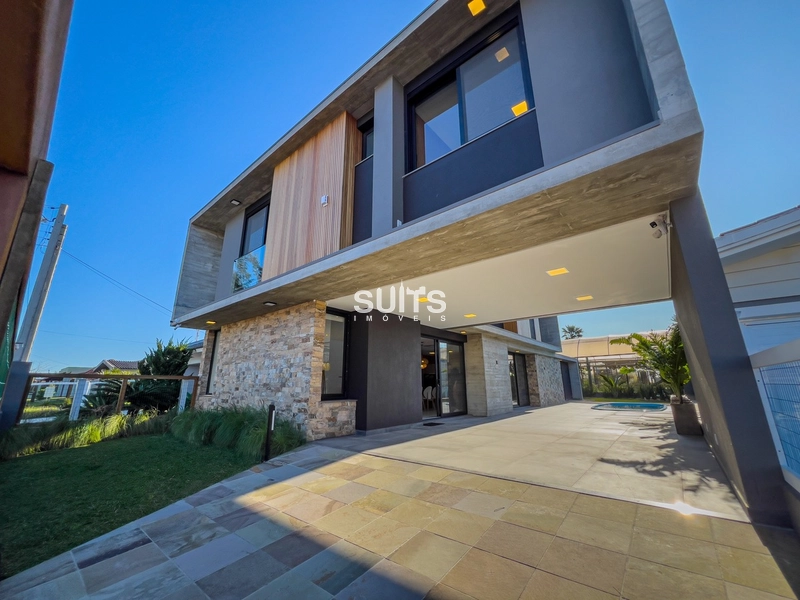 Excelente sobrado próximo do mar no centro de Xangri-Lá: 1ª foto da galeria de imagens do imóvel