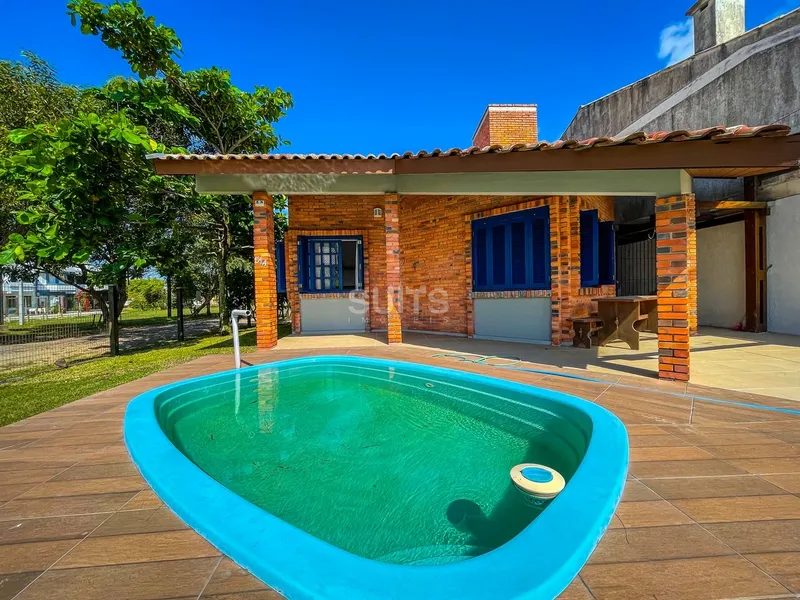 Excelente casa à venda próxima do mar no Centro de Xangri-Lá: 2ª foto da galeria de imagens do imóvel