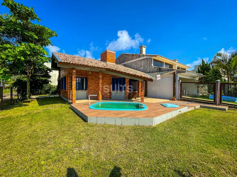 Excelente casa à venda próxima do mar no Centro de Xangri-Lá: 1ª foto da galeria de imagens do imóvel