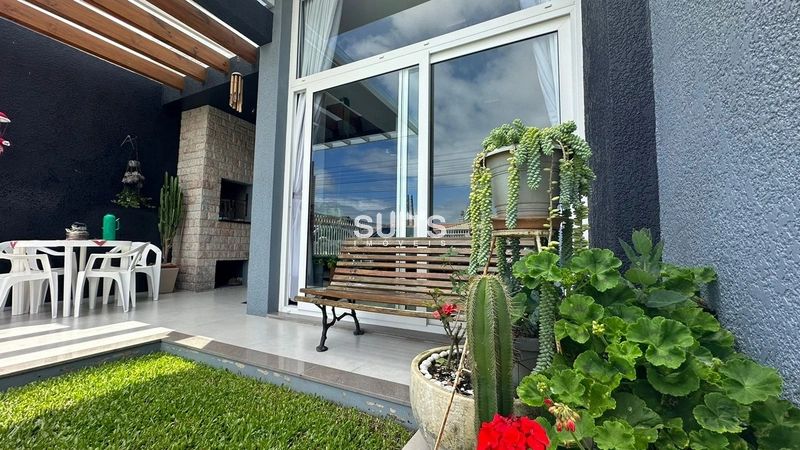 Linda casa geminada à venda no Centro de Xangri-Lá: 2ª foto da galeria de imagens do imóvel