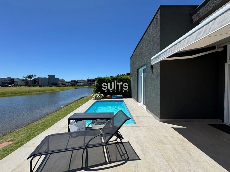 Excelente casa com linda vista para o lago no condomínio Riviera: 22ª foto da galeria de imagens do imóvel