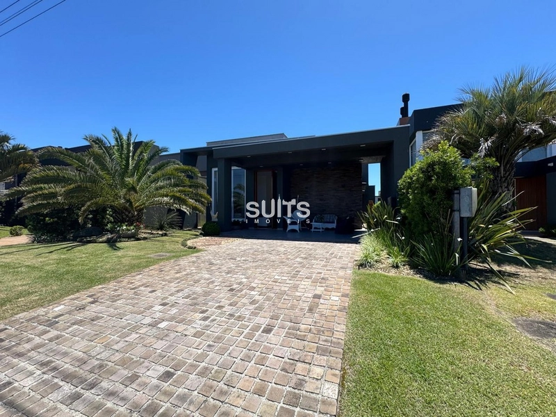 Excelente casa com linda vista para o lago no condomínio Riviera: 2ª foto da galeria de imagens do imóvel