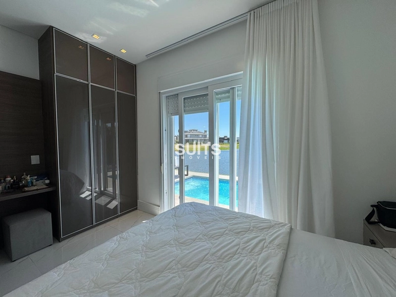 Excelente casa com linda vista para o lago no condomínio Riviera: 30ª foto da galeria de imagens do imóvel