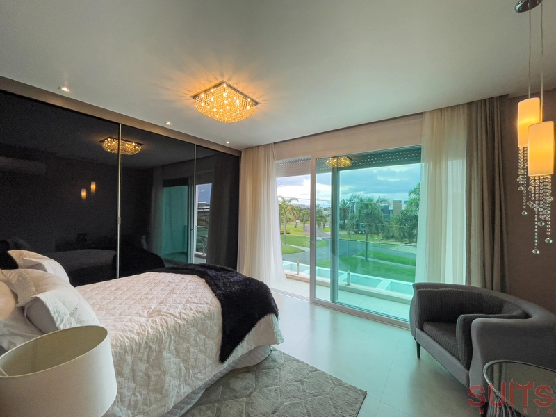 Linda mansão beira lago no condomínio Enseada: 24ª foto da galeria de imagens do imóvel