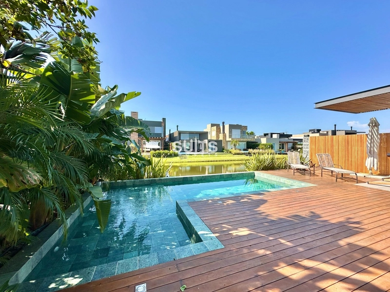 Excelente sobrado beira lago à venda no condomínio Riviera: 30ª foto da galeria de imagens do imóvel