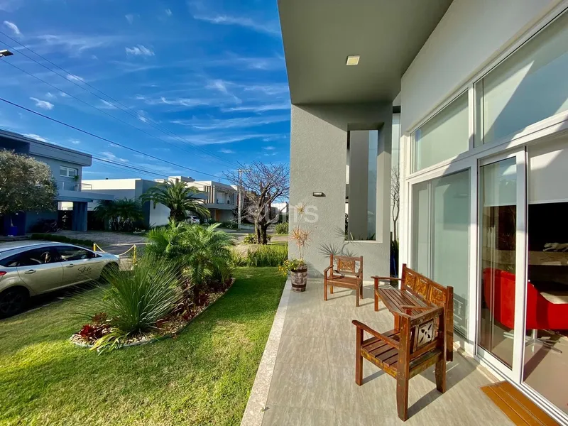 Casa beira lago do lago no cond. Malibu: 5ª foto da galeria de imagens do imóvel