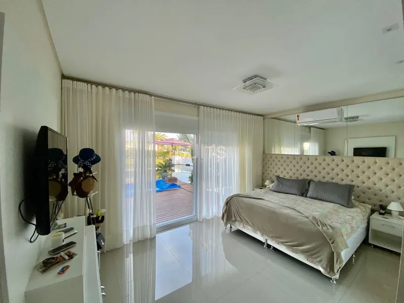 Casa beira lago do lago no cond. Malibu: 31ª foto da galeria de imagens do imóvel