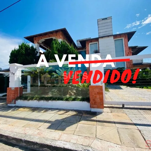 Incrível sobrado de esquina na praia de Atlântida em Xangri-Lá: 1ª foto da galeria de imagens do imóvel