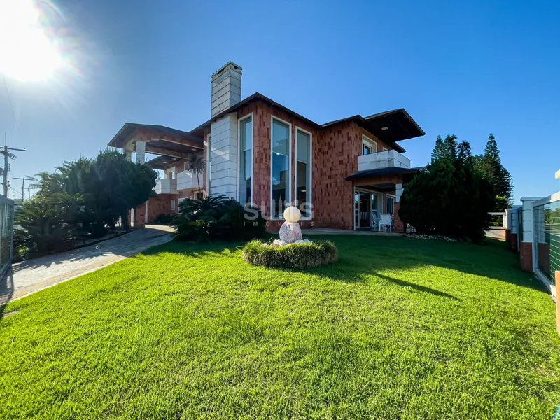 Incrível sobrado de esquina na praia de Atlântida em Xangri-Lá: 2ª foto da galeria de imagens do imóvel