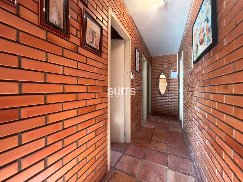 Excelente casa em 2 terrenos à venda no Centro de Xangri-lá: 4ª foto da galeria de imagens do imóvel