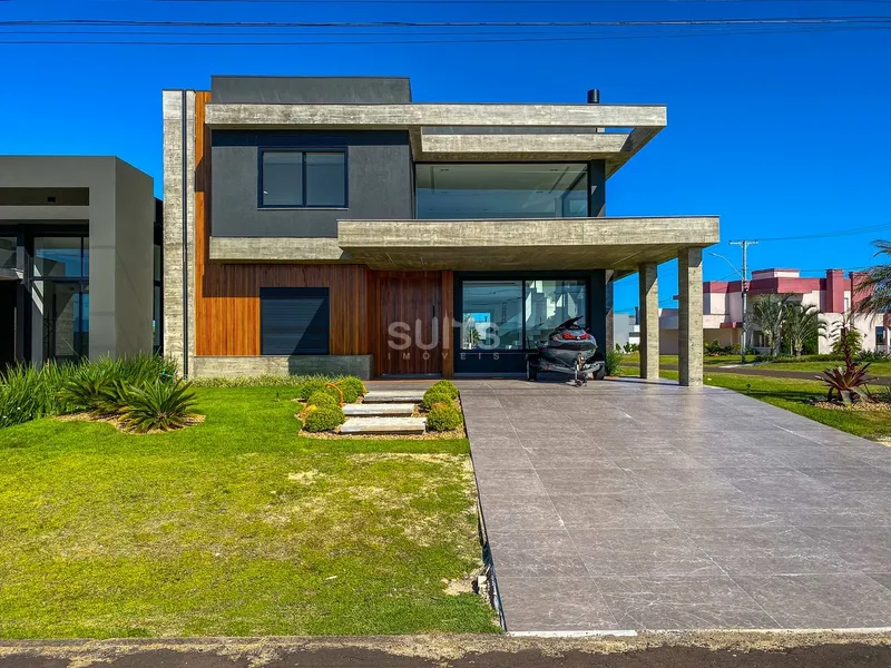 Excelente sobrado de esquina no condomínio Riviera: 2ª foto da galeria de imagens do imóvel