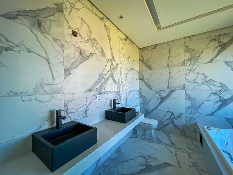 Excelente sobrado de esquina no condomínio Riviera: 4ª foto da galeria de imagens do imóvel