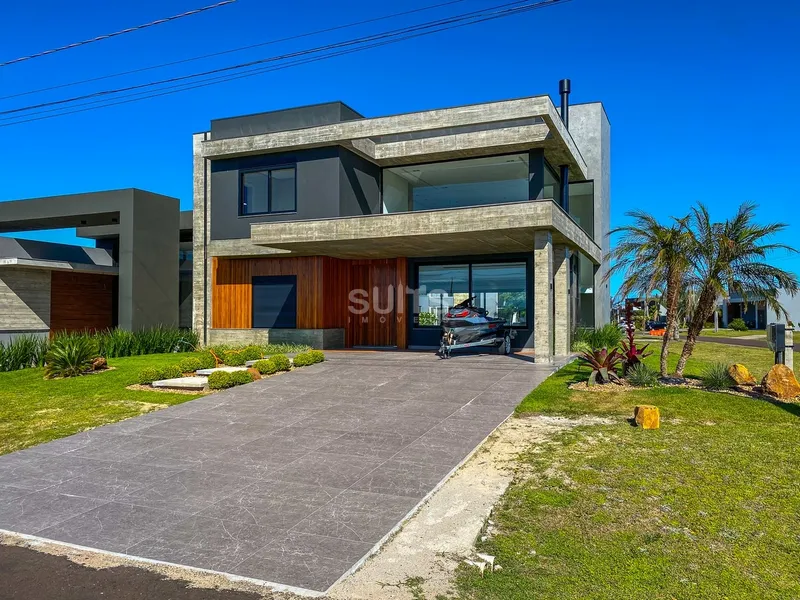 Excelente sobrado de esquina no condomínio Riviera: 1ª foto da galeria de imagens do imóvel