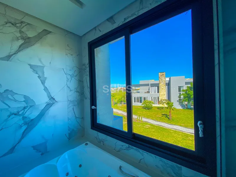 Excelente sobrado de esquina no condomínio Riviera: 5ª foto da galeria de imagens do imóvel