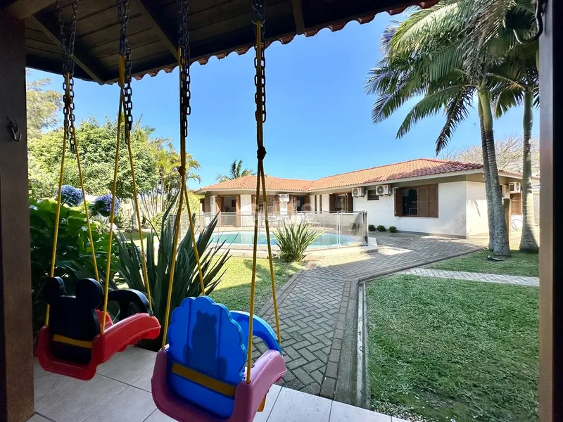 Excelente casa com 02 terrenos no Centro de Xangri-Lá: 44ª foto da galeria de imagens do imóvel