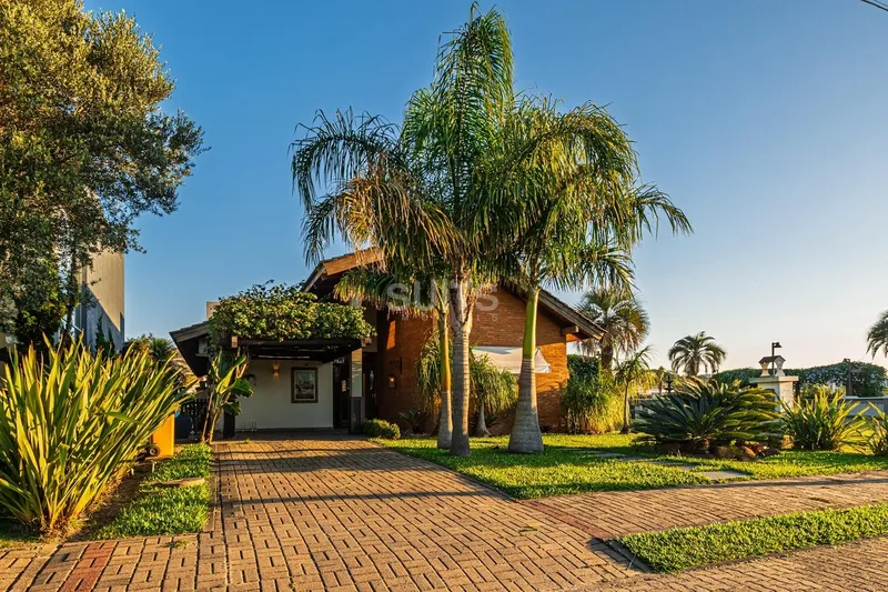 Excelente casa beira lago à venda no condomínio Sea Coast: 1ª foto da galeria de imagens do imóvel