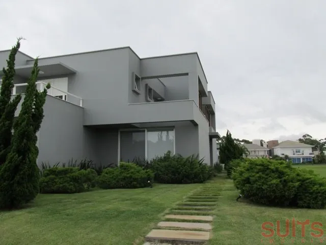 Linda Mansão no Condomínio Bosques de Atlântida: 3ª foto da galeria de imagens do imóvel