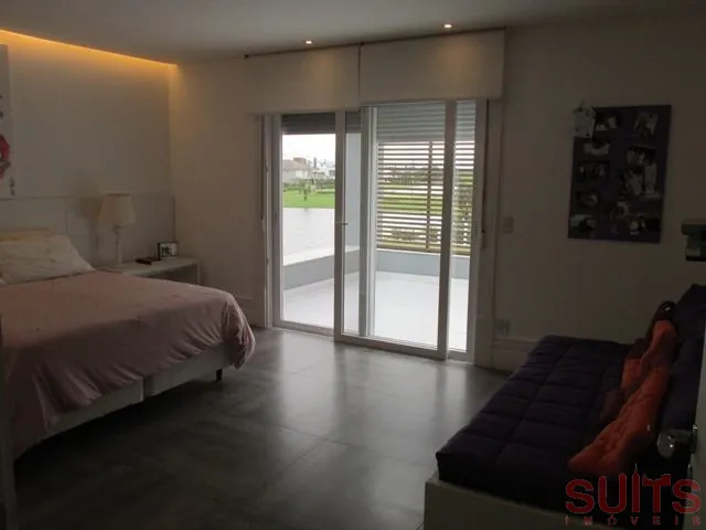 Linda Mansão no Condomínio Bosques de Atlântida: 27ª foto da galeria de imagens do imóvel