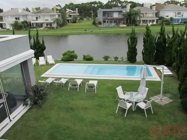 Linda Mansão no Condomínio Bosques de Atlântida: 54ª foto da galeria de imagens do imóvel