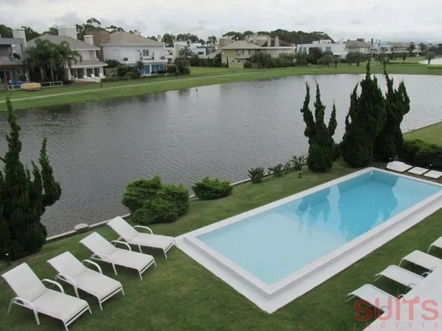 Linda Mansão no Condomínio Bosques de Atlântida: 50ª foto da galeria de imagens do imóvel