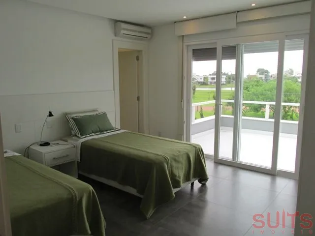 Linda Mansão no Condomínio Bosques de Atlântida: 33ª foto da galeria de imagens do imóvel