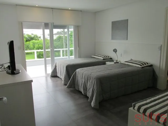 Linda Mansão no Condomínio Bosques de Atlântida: 41ª foto da galeria de imagens do imóvel