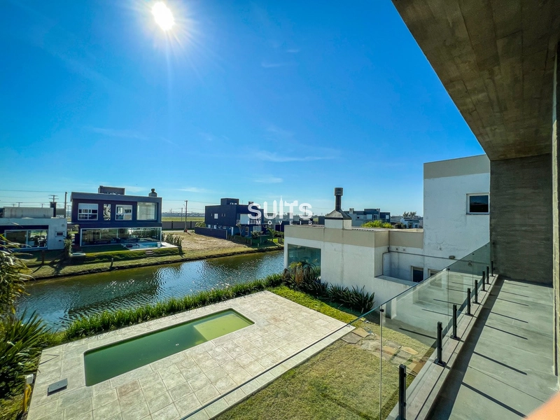 Lindo sobrado beira lago no condomínio Riviera: 24ª foto da galeria de imagens do imóvel