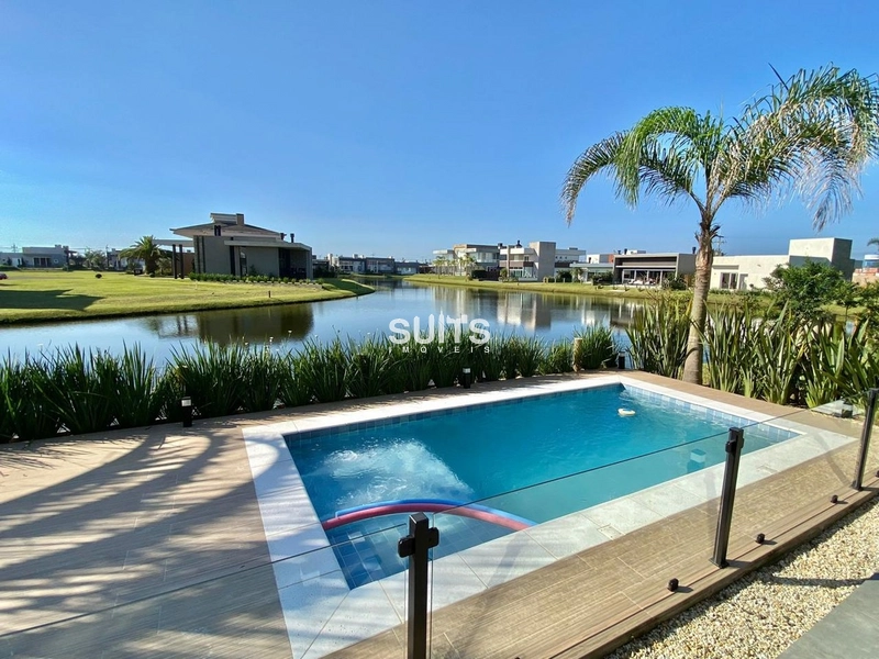 Belíssimo sobrado beira lago à venda no condomínio Riviera: 19ª foto da galeria de imagens do imóvel