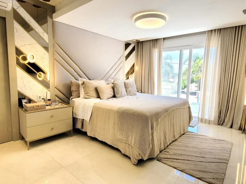 Sobrado nas margens do lago no condomínio Bosques de Atlântida: 43ª foto da galeria de imagens do imóvel