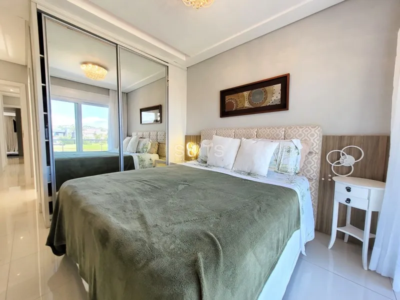 Sobrado nas margens do lago no condomínio Bosques de Atlântida: 39ª foto da galeria de imagens do imóvel