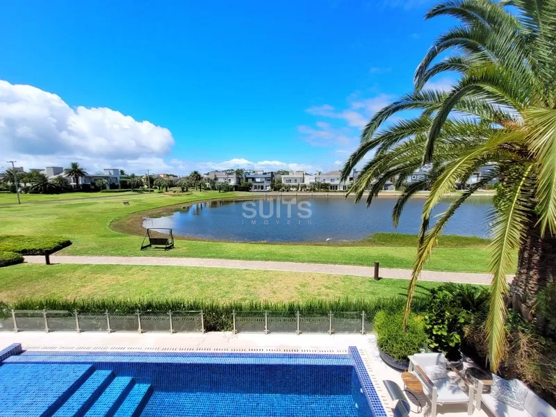 Sobrado nas margens do lago no condomínio Bosques de Atlântida: 34ª foto da galeria de imagens do imóvel