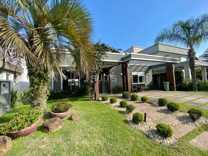 Belíssima casa no condomínio Villaggio Atlântida: 3ª foto da galeria de imagens do imóvel