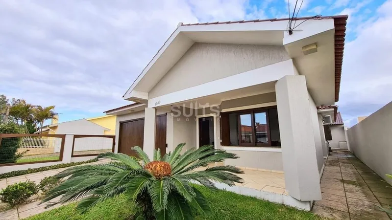 Linda casa com 02 terrenos no centro de Xangri-Lá: 3ª foto da galeria de imagens do imóvel