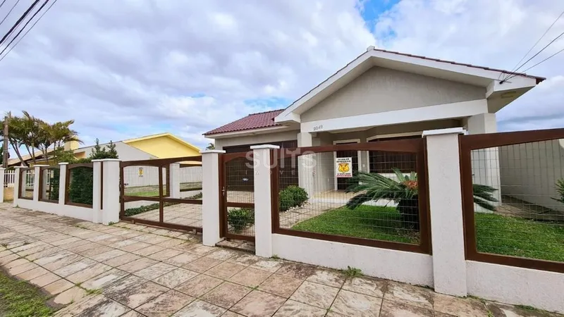 Linda casa com 02 terrenos no centro de Xangri-Lá: 2ª foto da galeria de imagens do imóvel