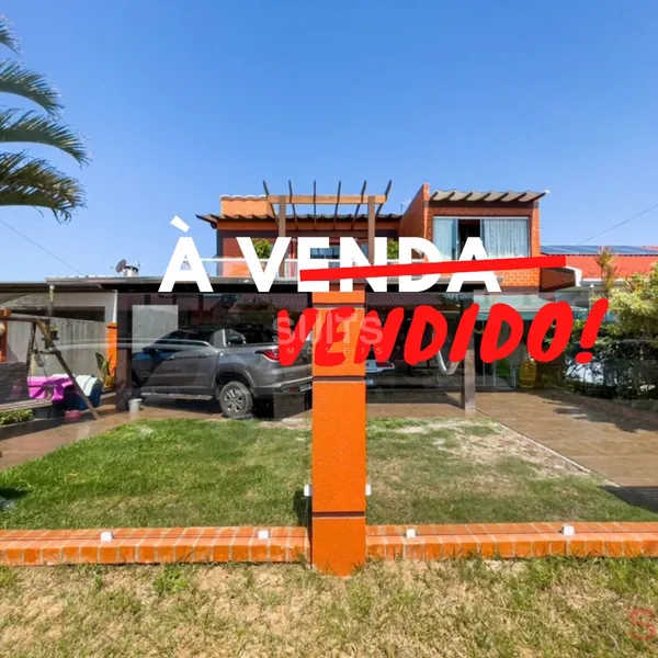 Ótimo sobrado à venda na praia de Rainha do Mar em Xangri-Lá: 1ª foto da galeria de imagens do imóvel